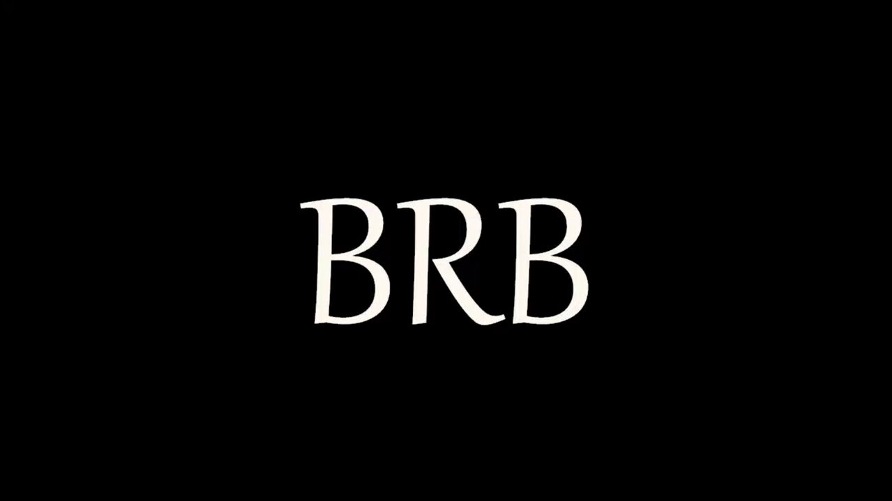 Video of two nude transgender women with medium-sized breasts, one with a short bob, the other with dark hair, engaged in sexual activity on a bed, bo